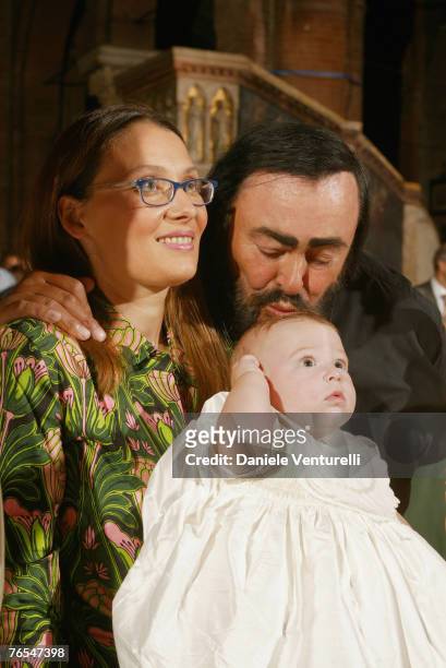 The picture taken in August 30, 2003 in Modena, Italy, shows opera singer Luciano Pavarotti with his wife Nicoletta Mantovani attending the...