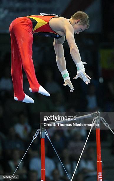 Fabian Hambuechen of Germany performs on the horizontal bar during the men's team final of the 40th World Artistic Gymnastics Championships on...