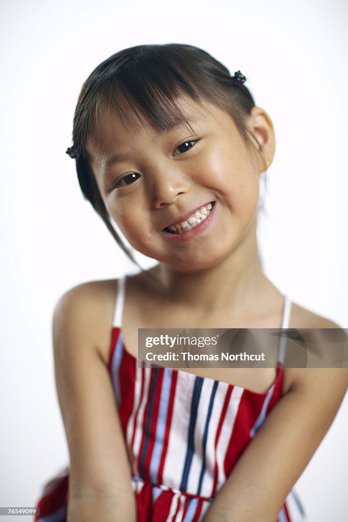 Girl (3-5) smiling, portrait, close-up