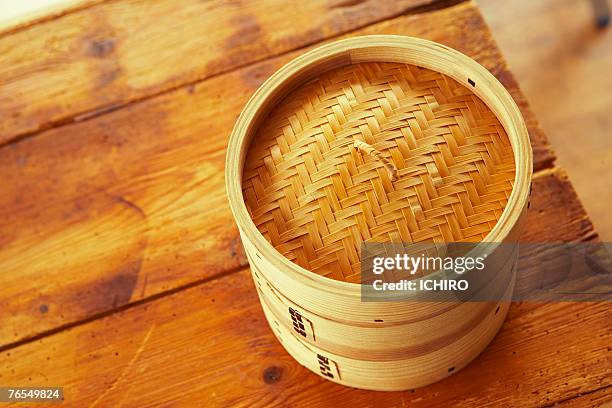 bamboo steamer on wooden table - lohas stock pictures, royalty-free photos & images