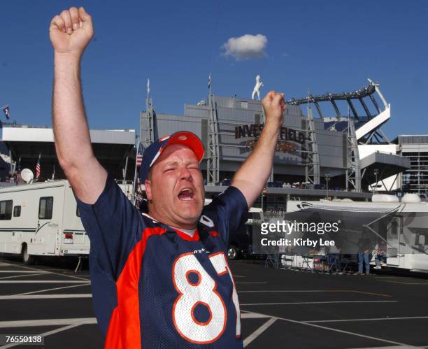 Denver Broncos wearing a No. 87 David Kircus jersey shouts outside of Invesco Field during tailgate festivities before NBC Sunday Night Football game...