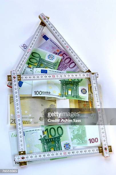 bank notes and folding ruler - two hundred euro banknote stock pictures, royalty-free photos & images