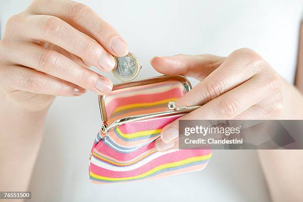 woman with change purse, close-up - silver purse stock pictures, royalty-free photos & images