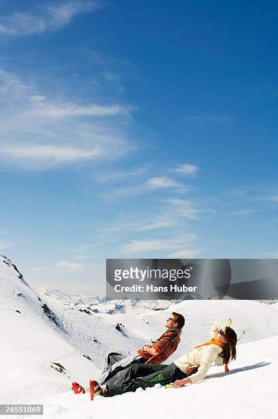 couple in mountains - après ski stock-fotos und bilder
