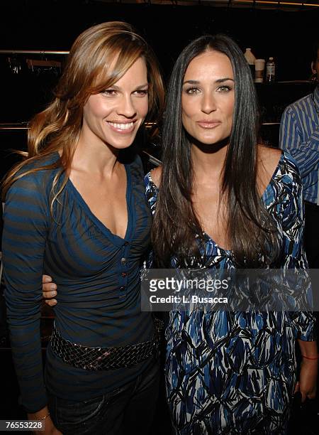 Actress Hilary Swank and actress Demi Moore backstage at Miss Sixty Spring 2008 during Mercedes-Benz Fashion Week at the Tent, Bryant Park on...