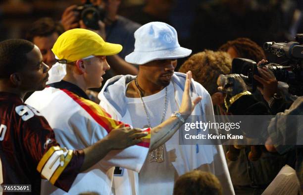 Deshaun Holton AKA "Proof" of D12 & Eminem waves his hand in the face of Triumph, The Comic Dog, after Triumph involved Eminem in commentary about...