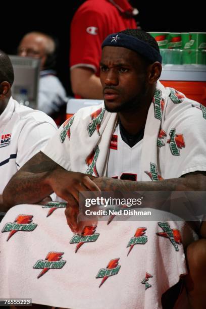 LeBron James of the USA Men's Senior National Team takes a rest on the bench during the second round of the 2007 FIBA Americas Championship against...