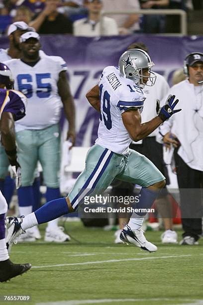 Miles Austin of the Dallas Cowboys carries the ball against the Minnesota Vikings on August 30, 2007 at the Metrodome in Minneapolis, Minnesota. The...