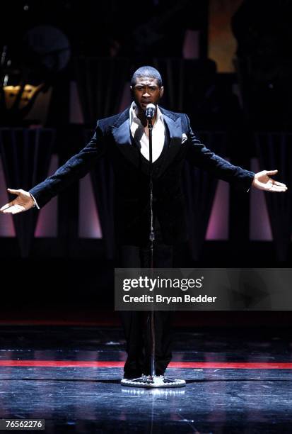 Singer Usher performs onstage at the Conde Nast Media Group's Fourth Annual Fashion Rocks Concert at Radio City Music Hall September 6, 2007 in New...