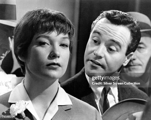 American actress Shirley MacLaine as Fran Kubelik and Jack Lemmon as C.C. 'Bud' Baxter in a scene from 'The Apartment', directed by Billy Wilder,...