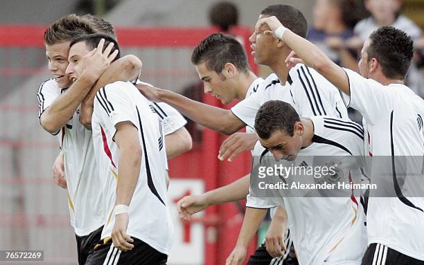 September 07: Timo Gebhardt of Germany celebrates with his team mates after scoring a goal during the U19 international friendly match between...