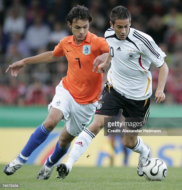 September 07: Mario Vrancic of Germany competes with Nacer Barazite of the Netherlands during the U19 international friendly match between Germany...