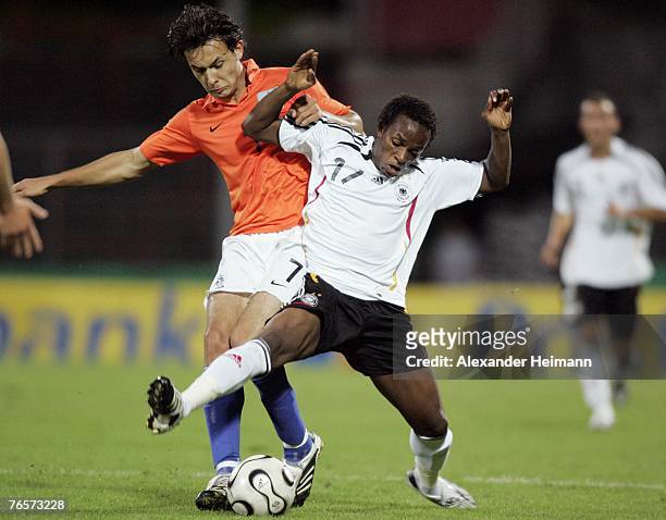 September 07: Savio Nsereko of Germany competes with Nacer Barazite of the Netherlands during the U19 international friendly match between Germany...