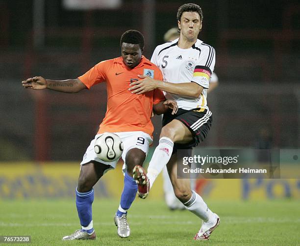 September 07: Kevin Pezzoni of Germany competes with Genero Zeefuik of the Netherlands during the U19 international friendly match between Germany...