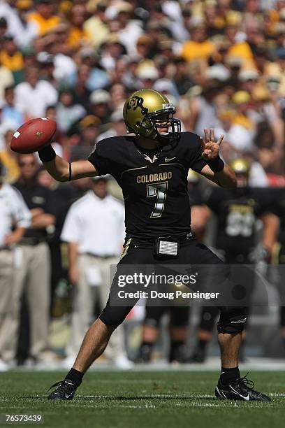 Cody Hawkins of the Colorado Buffaloes passes against the Colorado State Rams at INVESCO Field at Mile High on September 1, 2007 in Denver, Colorado....