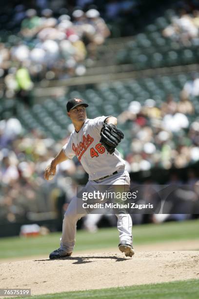 Jeremy Guthrie of the Baltimore Orioles pitches during the game against the Oakland Athletics at the McAfee Coliseum in Oakland, California on July...