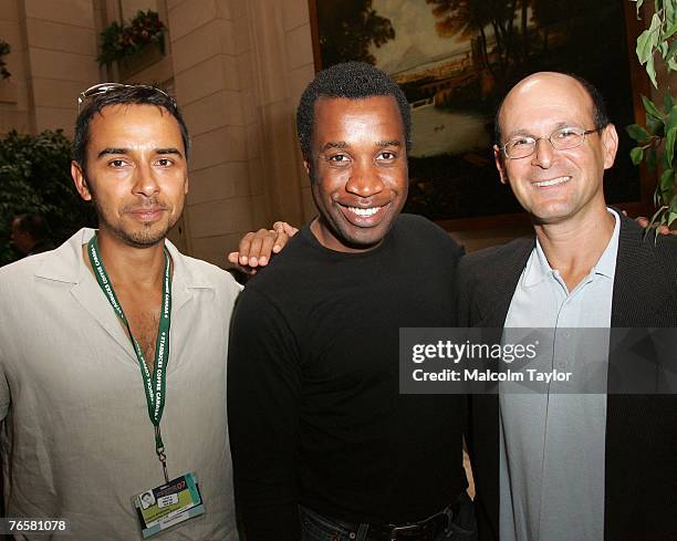 Film rep Damon D'Oliveira, director Clement Virgo and Thinkfilm president and CEO Jeff Sackman attend Thinkfilm's TIFF Breakfast at Windsor Arms...