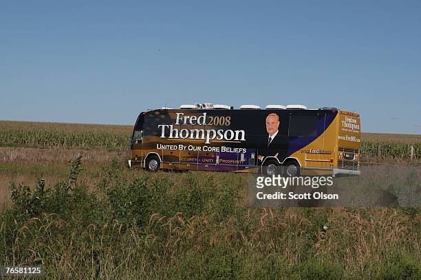 The campaign bus of Actor and former U.S. Senator Fred Thompson passes through the countryside during a campaign swing through Iowa September 7, 2007...