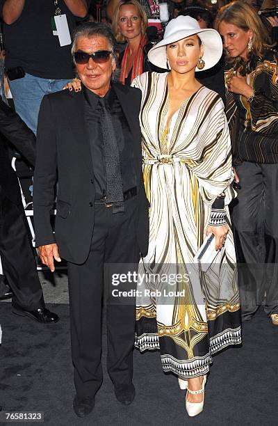 Actress/singer Jennifer Lopez and designer Roberto Cavalli attend the Just Cavalli flagship store launch party during Mercedes-Benz Fashion Week...