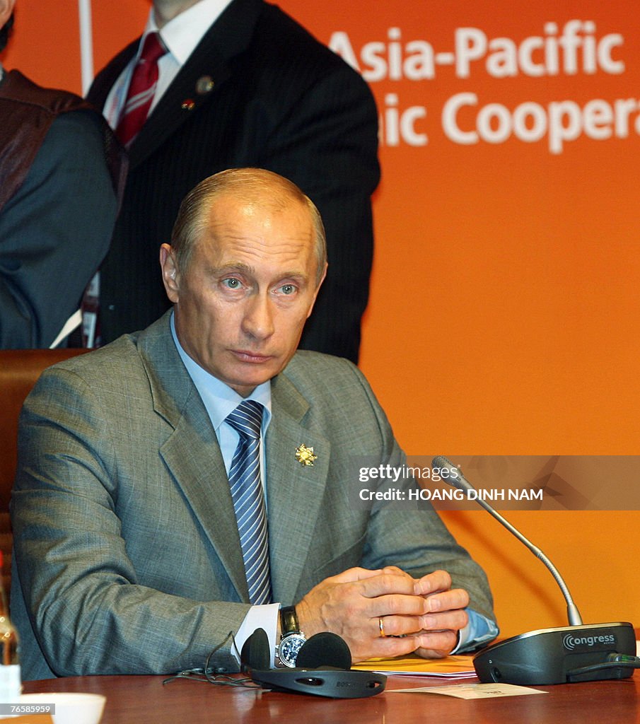 Russian President Valadimir Putin attend