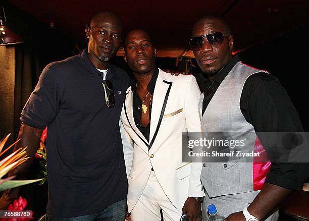 Actor Djimon Hounsou, designer Nana Boateng and Jason Lewis attend the Kimora Lee Simmons & KLS Collection Spring 2008 fashion show during...