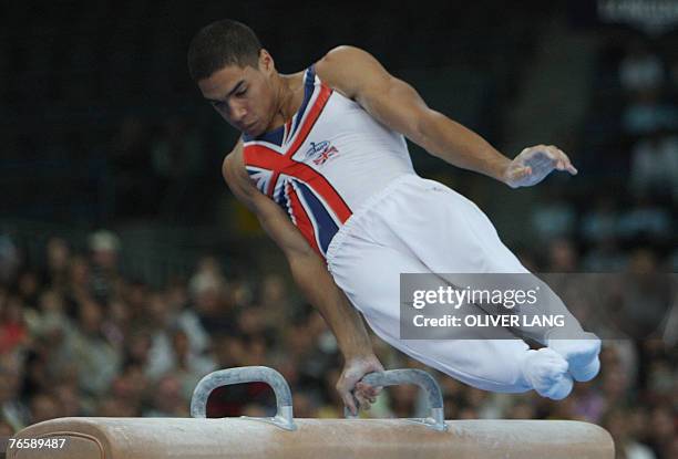 Louis Smith of Britain competes on the pommel horse during the men's apparatus final on the pommel horse of the 40th World Artistic Gymnastics...