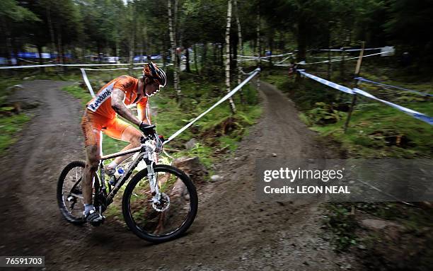 Jelmer Pietersma of Holland works his way through the technical area of the course in the Elite Men's Cross Country finals at the 2007 UCI Mountain...