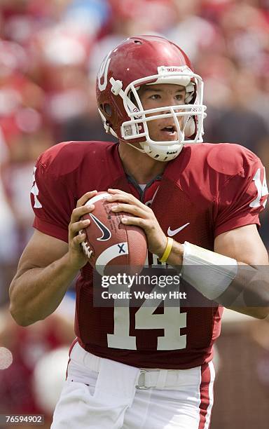 Sam Bradford of the Oklahoma Sooners looks to throw a pass against the Miami Hurricanes at Gaylord Family-Oklahoma Memorial Stadium September 8, 2007...