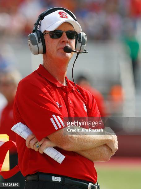 Coach Tom O'Brien of the North Carolina Wolfpack watches the game against the Boston College Eagles at Alumni Stadium September 8, 2007 in Chestnut...