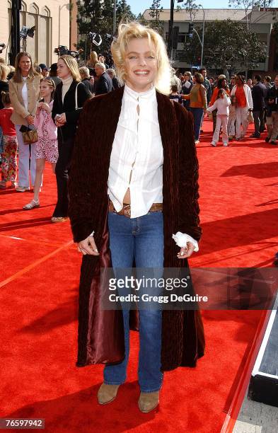 Erika Eleniak arrives on the red carpet for the 20th Anniversary Premiere of Steven Spielberg's "E.T." on March 16, 2000 in Los Angeles, California.