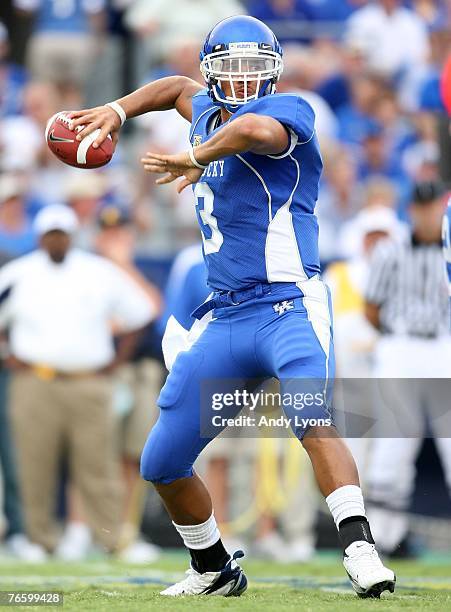 Andre Woodson of the Kentucky Wildcats throws a pass during the game against the Kent State Golden Flashes on September 8, 2007 at Commonwealth...