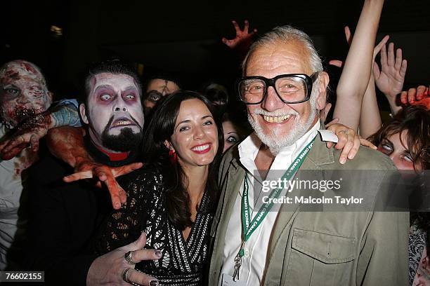 Actress Michelle Morgan and director George A. Romero arrives at the "George A. Romero's Diary of the Dead" World Premiere screening during the...