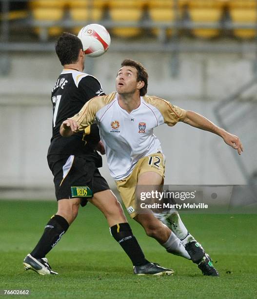 Paul Kohler of the Jets heads the ball with Felipe of the Phoenix during the round three A-League match between the Wellington Phoenix and the...