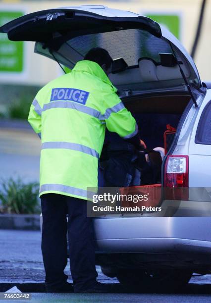 The Police photographer outside the scene where Augustine Akateuroa Borrell of Papatoetoe died after being stabbed in the chest in Hamilton Road,...