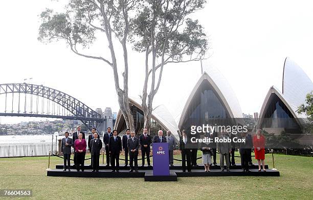 All economic leaders attending the Asia-Pacific Economic Cooperation meeting gather to listen to Australia Prime Minister John Howard's speech in...