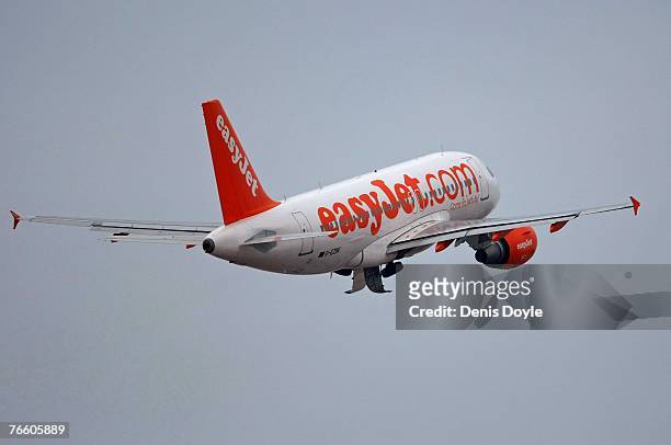 An easyjet plane takes off carrying Kate and Gerry McCann the parents of missing four-year-old Madeleine McCann from Faro airport back to England on...