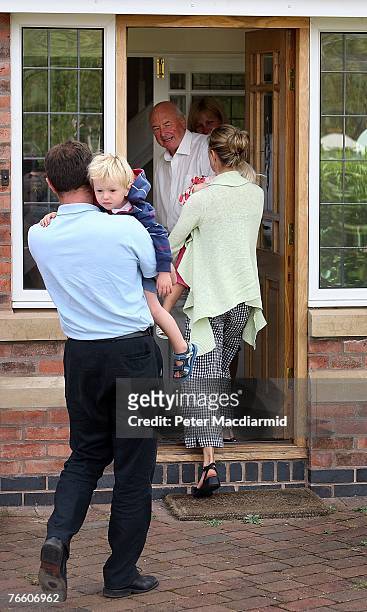 Gerry and Kate McCann arrive home with their twins Sean and Amelie as Kate's Uncle Brian Kennedy looks on, on September 9, 2007 in Rothley, England....
