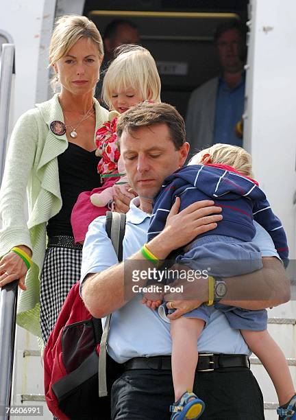 Kate and Gerry McCann, the parents of missing four-year-old Madeleine McCann arrive back in the UK to East Midlands airport with twins Sean and...