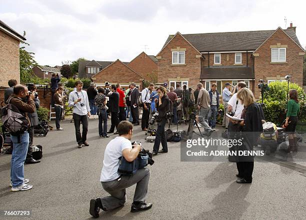 The media assemble outside the McCann's family home in Rothley, Leicestershire, before the family arrived home from Portugal 09 September 2007. The...