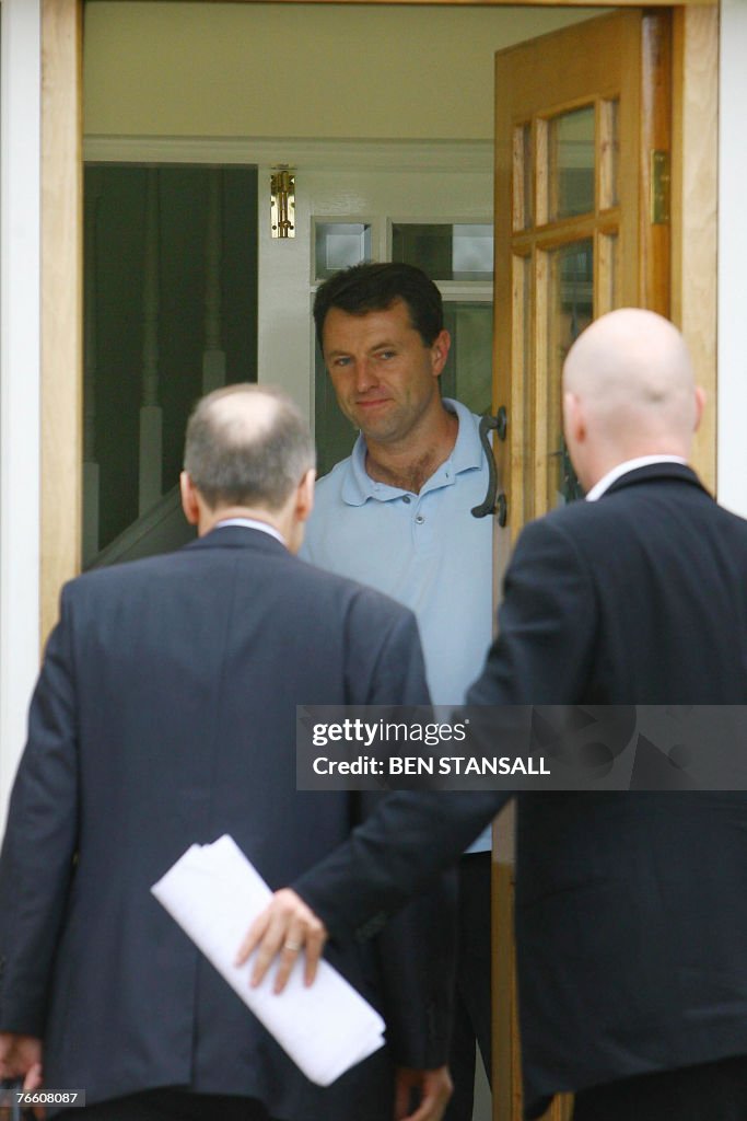 Gerry McCann welcomes unidentified guest