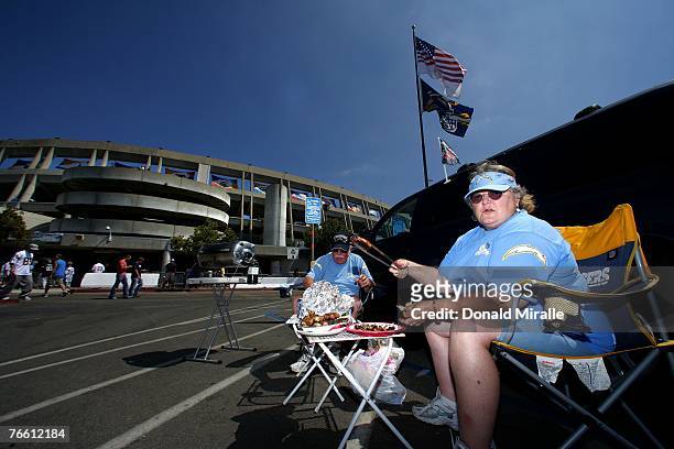 Chargers fans tailgate outside the stadium before the start of the Chicago Bears v San Diego Chargers NFL game at Qualcomm Stadium September 9, 2007...