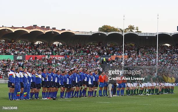 The Ireland and Namibia players line up for the national anthems at the start of Match Eight of the Rugby World Cup 2007 between Ireland and Namibia...