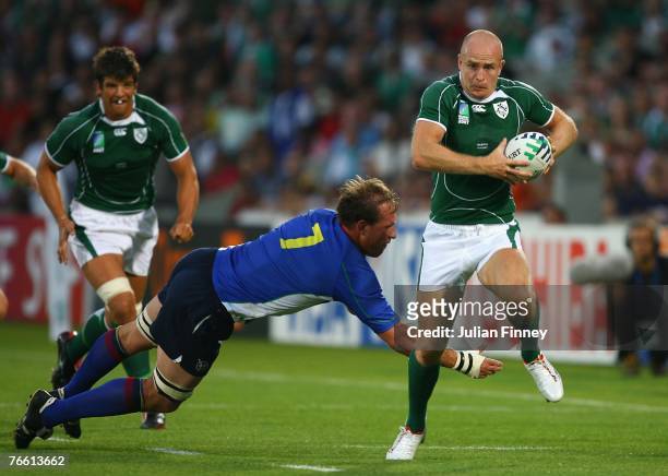 Dennis Hickie of Ireland avoids the tackle from Heino Senakal of Namibia during Match Eight of the Rugby World Cup 2007 between Ireland and Namibia...