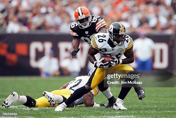Deshea Townsend of the Pittsburgh Steelers intercepts a ball intended for Tim Carter of the Cleveland Browns during their season opening game at...