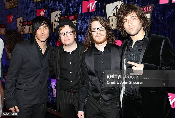 Basist Pete Wentz, Singer Patrick Stump, Drummer Andy Hurley and Guitarist Joe Trohman of Fall Out Boy arrive at the 2007 MTV Video Music Awards at...