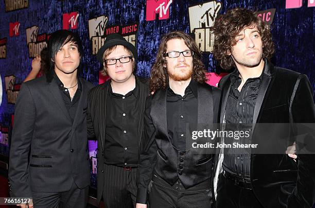 Basist Pete Wentz, Singer Patrick Stump, Drummer Andy Hurley and Guitarist Joe Trohman of Fall Out Boy arrive at the 2007 MTV Video Music Awards at...