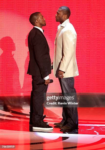 Rappers Kanye West and 50 Cent present the "Most Earth-Shattering Collaboration" award on stage during the 2007 MTV Video Music Awards held at The...