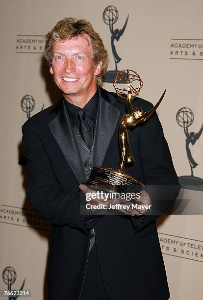 Producer Nigel Lythgoe accepts the Governor's Award for 'Idol Gives Back' at the 59th Annual Primetime Creative Arts Emmy Awards, held at the Shrine...