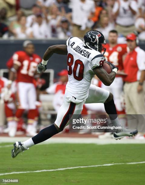 Andre Johnson of the Houston Texans runs for a touchdown against the Kansas City Chiefs at Reliant Stadium on September 9, 2007 in Houston, Texas.