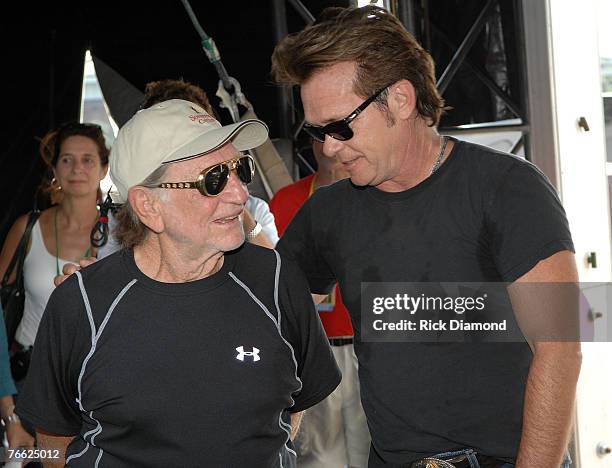 Farm Aid Founder/Artist Willie Nelson and Artist John Mellencamp Backstage at Farm Aid 2007 at ICAHN Stadium on Randall's Island, NY September 9,2007.